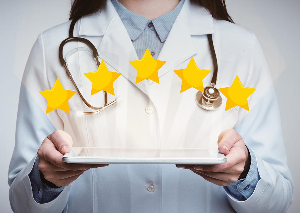 5 stars above a tablet held by a doctor represent hospital branding